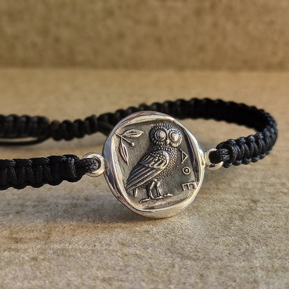 Macrame knitted bracelet with the figure of an  owl, the secret bird of Goddess Athena  and symbol of wisdom in sterling silver 925