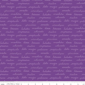 May include: Purple fabric with a repeating pattern of white cursive text. The text includes the words "lista magia", "poderosa", "inspirada", "preciosa", "amada", "serendipia", "luchadora", "madura", "diosa", "hermosa", "creativa", "empresaria", and "educada".