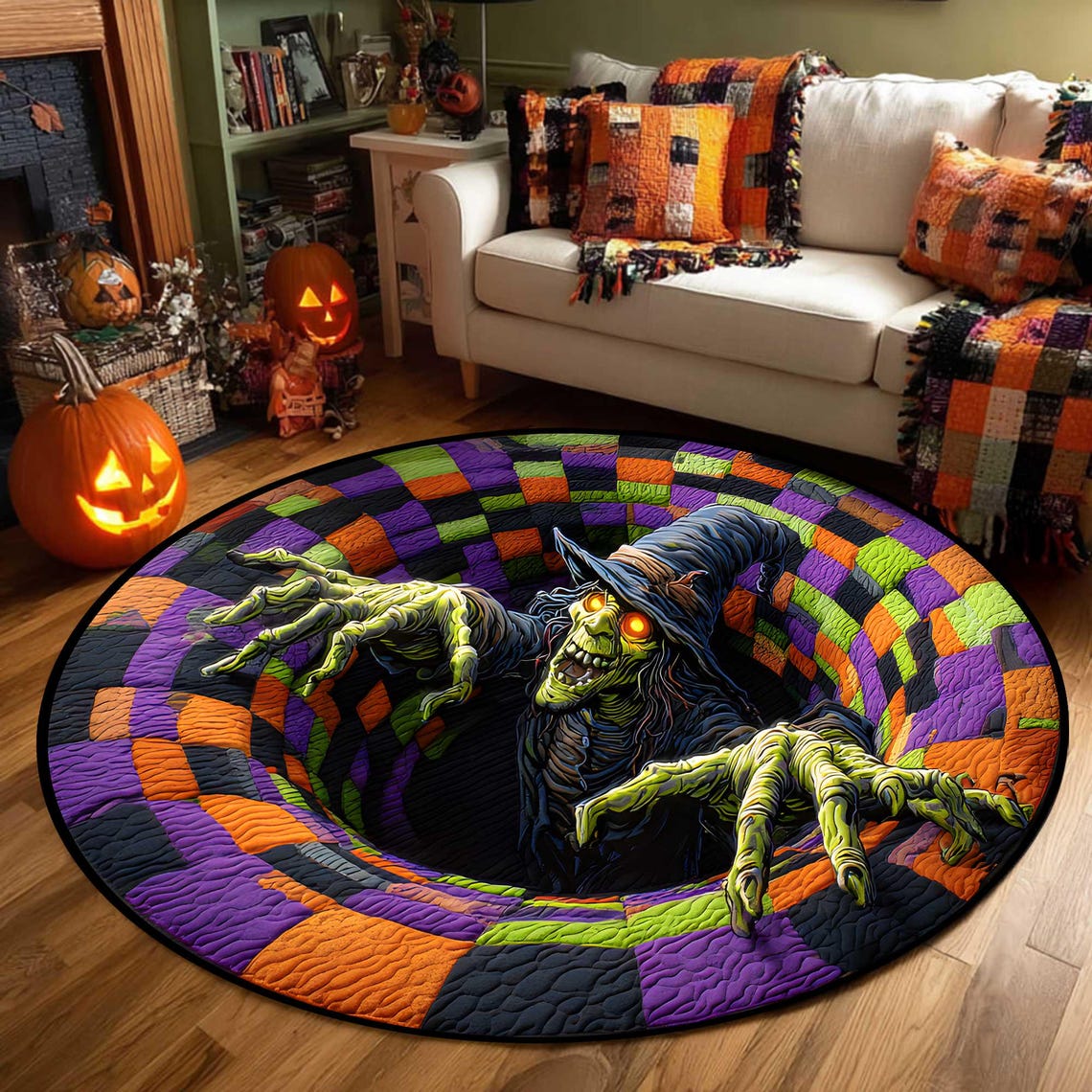 May include: A round Halloween rug featuring a spooky witch emerging from a hole. The rug has a colorful, checkered pattern in orange, purple, green, and black. The witch has green skin, a black hat, and glowing yellow eyes. The rug is placed on a wooden floor.