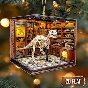 May include: A 2D flat ornament featuring a miniature museum diorama. The scene includes a Tyrannosaurus Rex skeleton, bookshelves, and a globe. The ornament has a brick wall and a checkered floor. The text "2D FLAT" is visible.