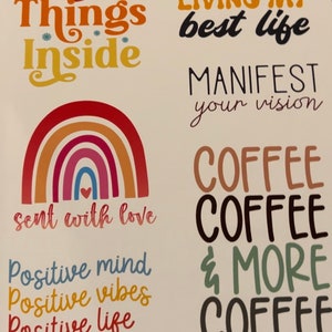 May include: A collection of colorful stickers with inspirational quotes and phrases. The stickers feature text such as "Pretty Things Inside," "Living My Best Life," and "Coffee, Coffee & More Coffee." A rainbow graphic is also included.