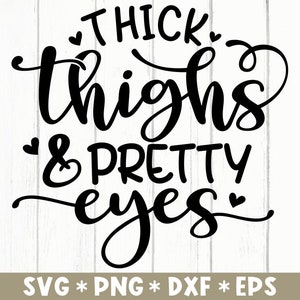 May include: Black and white graphic design with the text "Thick thighs & pretty eyes" in a cursive font.