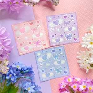 Journaling deco holo kawaii esthetisch stickervel - roze paars blauw schattige kawaii engelenvleugels hart strikken sterren harten sprankelende regenboog holo