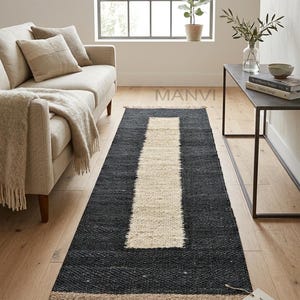 May include: A rustic wooden sign with the text "Welcome to our home" in a handwritten style. The sign features a distressed finish and a simple, inviting design, perfect for a front porch or entryway.