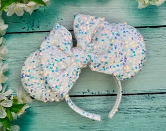 Stunning luxury Bridal white loose Sequin Mouse Ear Headband on white velvet