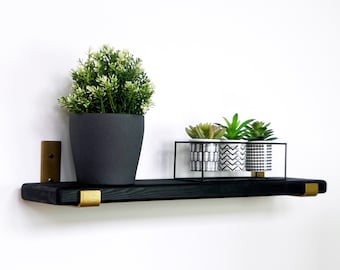 black & gold shelf with J style brackets