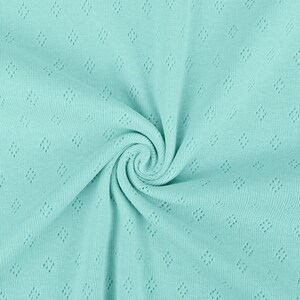 pointelle fabric, pointelle cotton jersey fabric peppermint mint colour with tiny diamond shaped holes