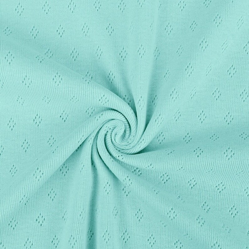 pointelle fabric, pointelle cotton jersey fabric peppermint mint colour with tiny diamond shaped holes