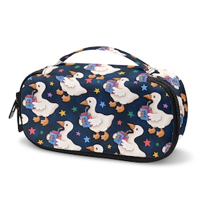 May include: A navy blue cosmetic bag with a repeating pattern of white geese holding juice boxes and colorful stars. The bag has a black zipper and a matching handle.