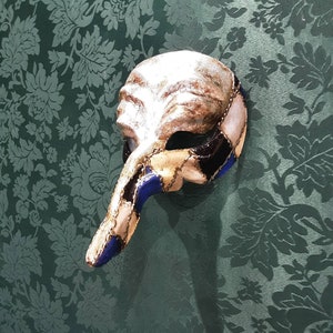 Venetian mask Zanni nose in papier-mâché, handmade with silver leaf decoration and colors