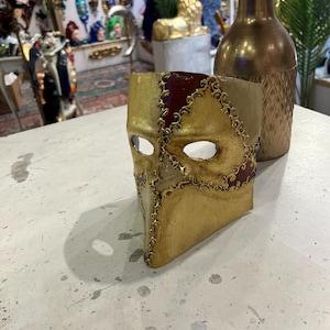 Venetian papier-mâché Bauta Casanova mask with gold leaf and baroque decorations