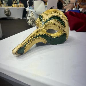 Zanni Mask from the Commedia Dell Arte in papier-mâché handmade with baroque decorations in gold leaf