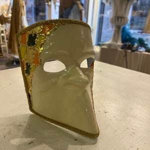 Venetian papier-mâché Bauta Casanova mask with gold leaf and baroque decorations