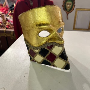 Venetian papier-mâché Bauta Casanova mask with gold leaf and baroque decorations