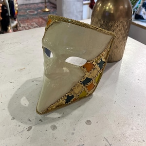 Venetian papier-mâché Bauta Casanova mask with gold leaf and baroque decorations