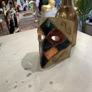 Venetian papier-mâché Bauta Casanova mask with gold leaf and baroque decorations