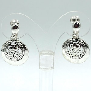 Clip on 1 1/2&quot; silver and black indented cutout dangle earrings