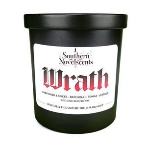 May include: Black scented candle with the word "Wrath" in red gothic font on a white label. The label also includes the text "Southern Novelscents" and scent notes. The candle is 8 oz (226g).