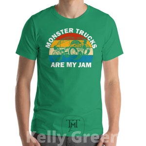 May include: A green t-shirt with a vintage-style graphic of a monster truck with the text "Monster Trucks Are My Jam".