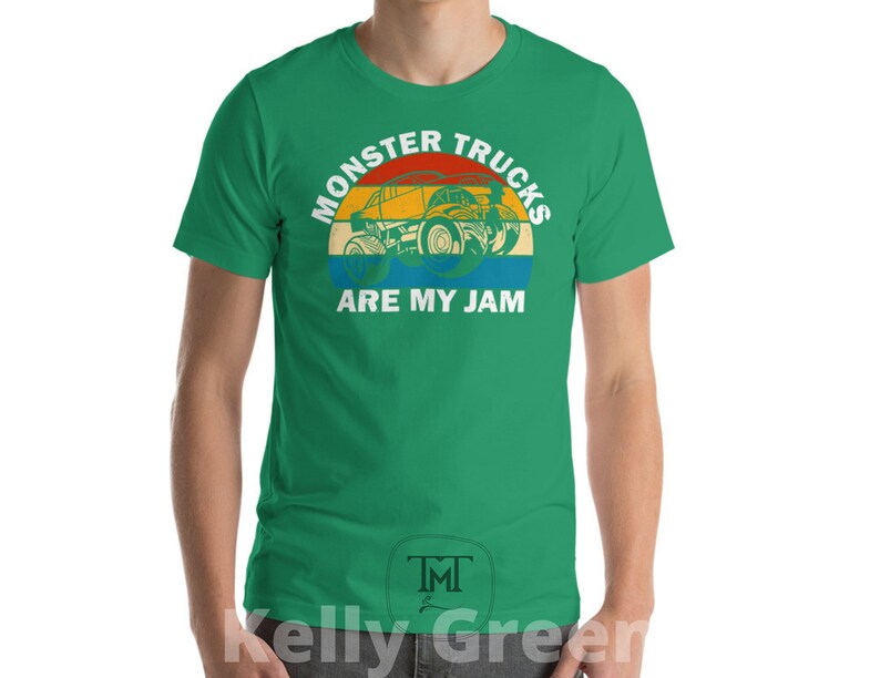 May include: A green t-shirt with a vintage-style graphic of a monster truck with the text "Monster Trucks Are My Jam".