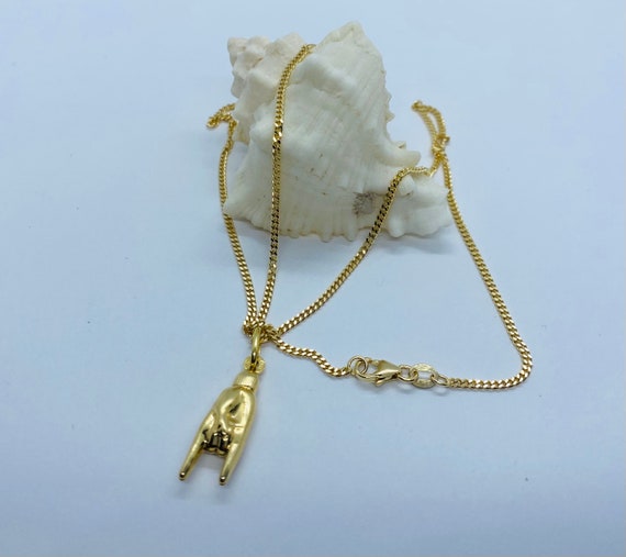 Gold hand pendant deals