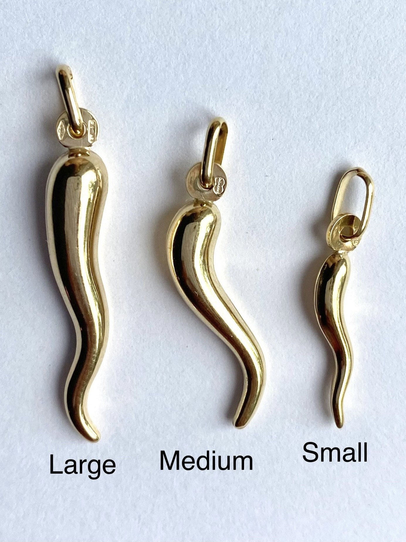 Parts of Four Little Horn gold-plated pendant earring