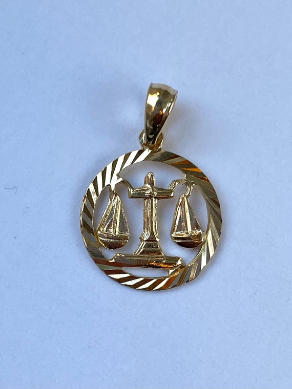 Gold store libra pendant