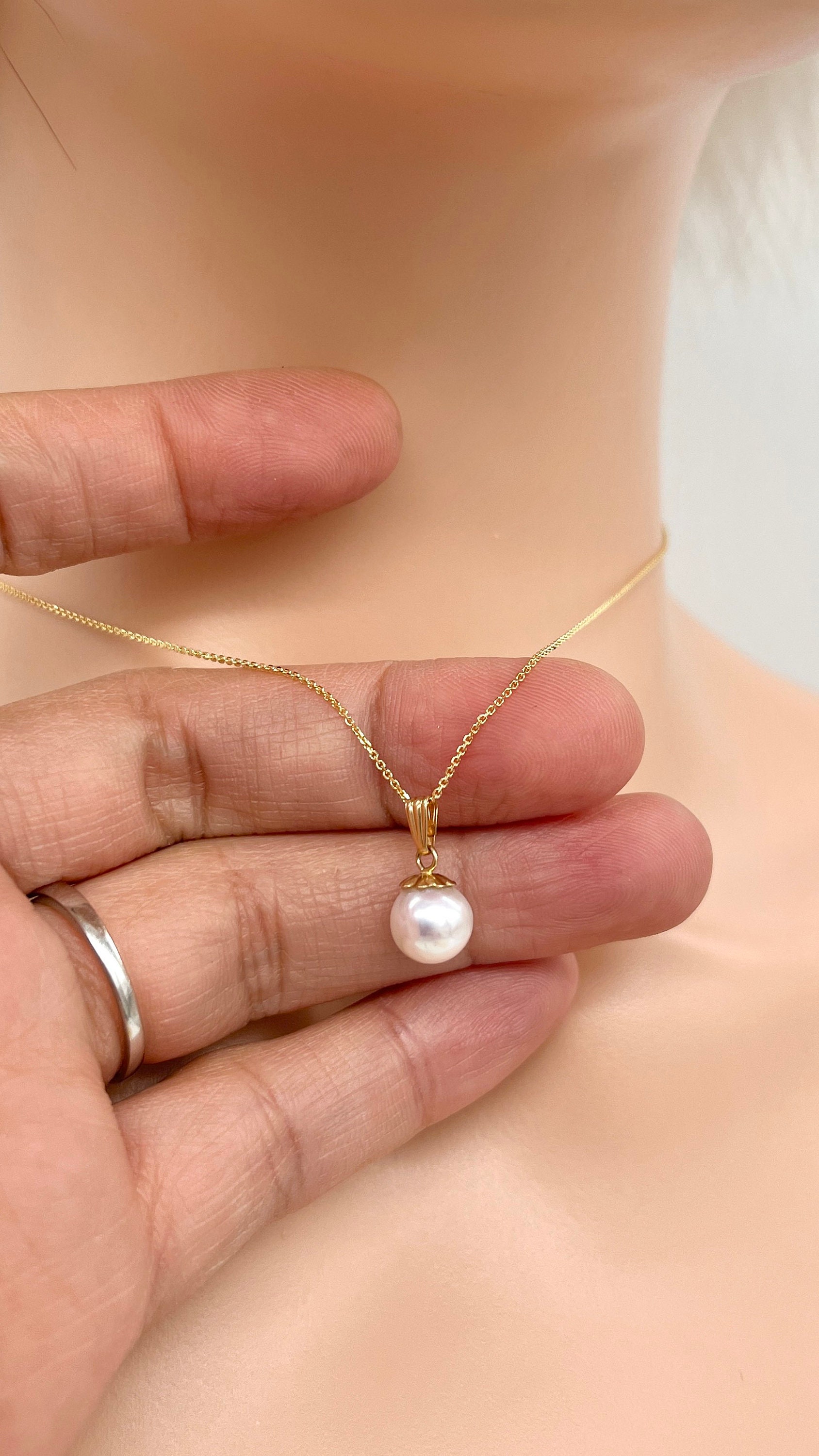 Gold Necklace with Pearl Pendant —