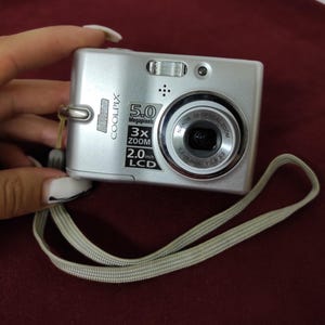 Digital camera Nikon Coolpix L10, working digital camera