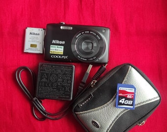 Digital camera Nikon Coolpix S3200 Black, working digital camera