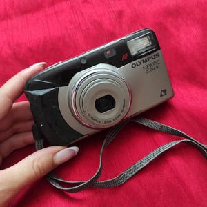 Vintage camera Olympus Newpic Zoom 90 APS-camera. Werkende filmcamera.
