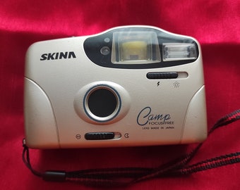Cámara de película Skina SK-777 vintage, compacta y de apuntar y disparar