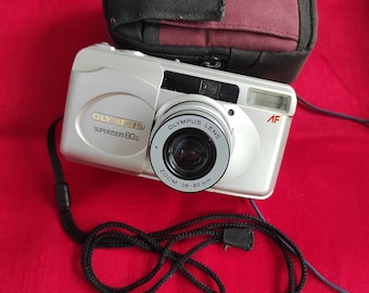 Vintage camera Olympus SUPERZOOM 80G. Film camera. Working chamber. Olympus camera . Working film camera.