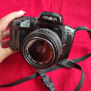 Vintage film camera Minolta Dynax 5xi +lens Sigma, working film camera