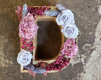 Letters/numbers, of your choice, inserted with dried flowers