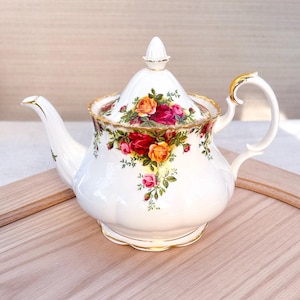 May include: A handmade wooden sign with the text "Welcome to our home" in a handwritten style. The sign is painted white with a dark stained frame. Dimensions are approximately 12 inches wide and 8 inches tall.