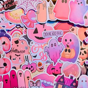 May include: A collection of pink and purple Halloween stickers featuring ghosts, pumpkins, bats, and the text "Happy Halloween".