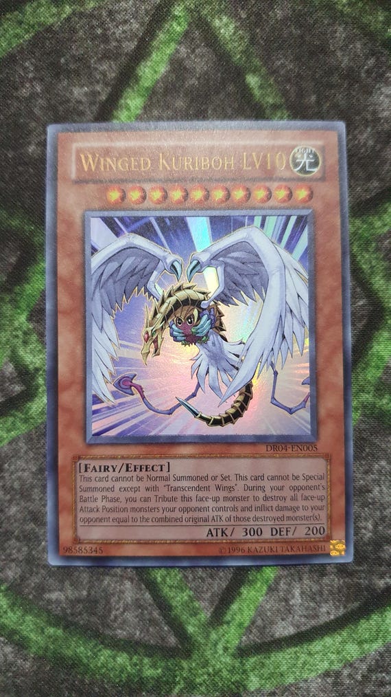 yugioh card winged kuriboh LV10 [DP1-EN006] Rare You can only Special Summon Winged Kuriboh LV6 once per turn this way Winged Kuriboh - Maze of