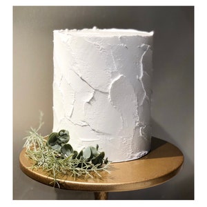 White spatula texture tall fake/faux cake