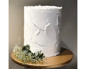 White spatula texture tall fake/faux cake