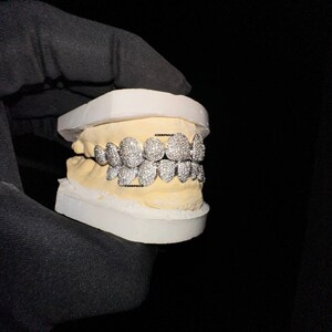 Fully iced deals out grillz