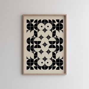 May include: A black and white geometric pattern print with a beige background. The pattern is made up of circles, semi-circles, and squares.