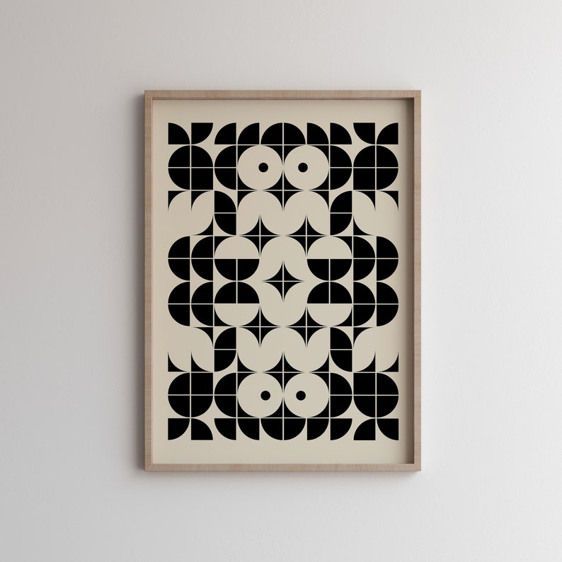 May include: A black and white geometric pattern print with a beige background. The pattern is made up of circles, semi-circles, and squares.