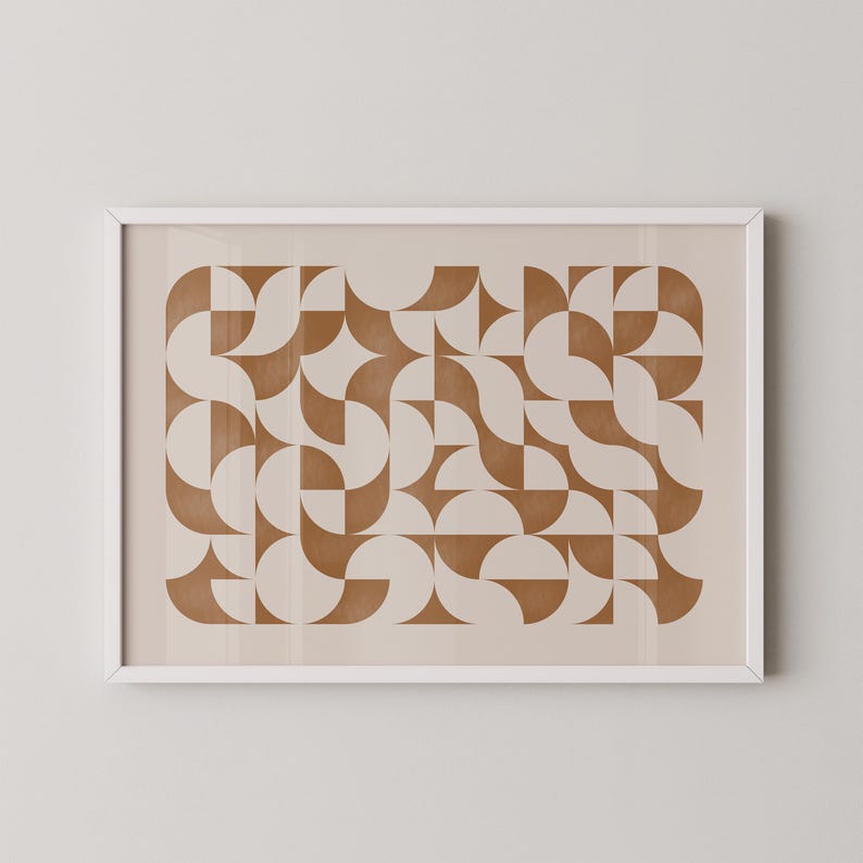 May include: A framed print with a geometric pattern of brown semi-circles and squares on a white background.