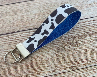 Cow print,key fob key chain with navy glitter backing,cute cow keychain, keychains, glitter keychain, western keychain, cow keychain