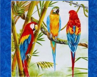 May include: A fabric panel featuring colorful parrots and toucans in a tropical setting. The birds are depicted perched on branches amidst lush foliage. The panel has a blue border with a palm frond pattern.