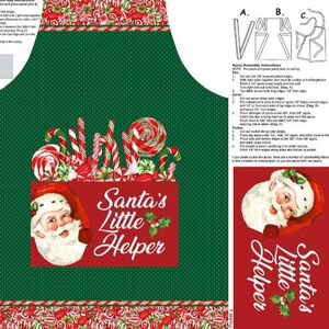 May include: A Christmas-themed apron with a green background and a red border. The apron features a Santa Claus graphic and the text "Santa's Little Helper." Candy canes and lollipops are also depicted. The apron is designed for holiday use.