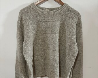Hem and Thread Sweater. Balloon sleeve striped pattern sweater.