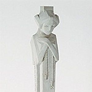 May include: A tall, light gray sculpture of a woman with geometric features. The figure has a stylized head and arms, with hanging chains. The sculpture is mounted on a tiered base with geometric details, showcasing an Art Deco style.