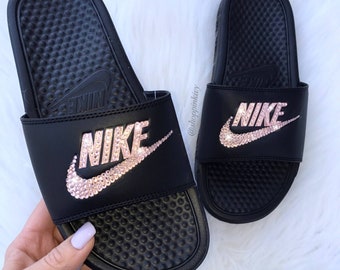 red and gold nike slides